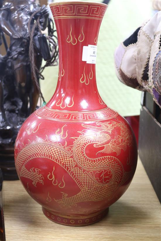 A Chinese red ground dragon vase